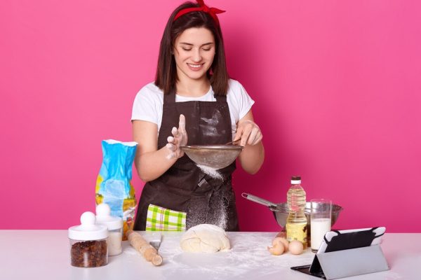 portrait-skillful-talented-cook-putting-flour-through-sieve-half-ready-pie-with-raisin-brunette-cute-young-model-poses-isolated-bright-pink-baking-cooking-concept_176532-8425 Complete Baking Excellence Program
